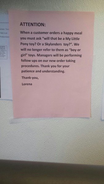 An employee sign asking cashiers to emphasize toy name over toy 